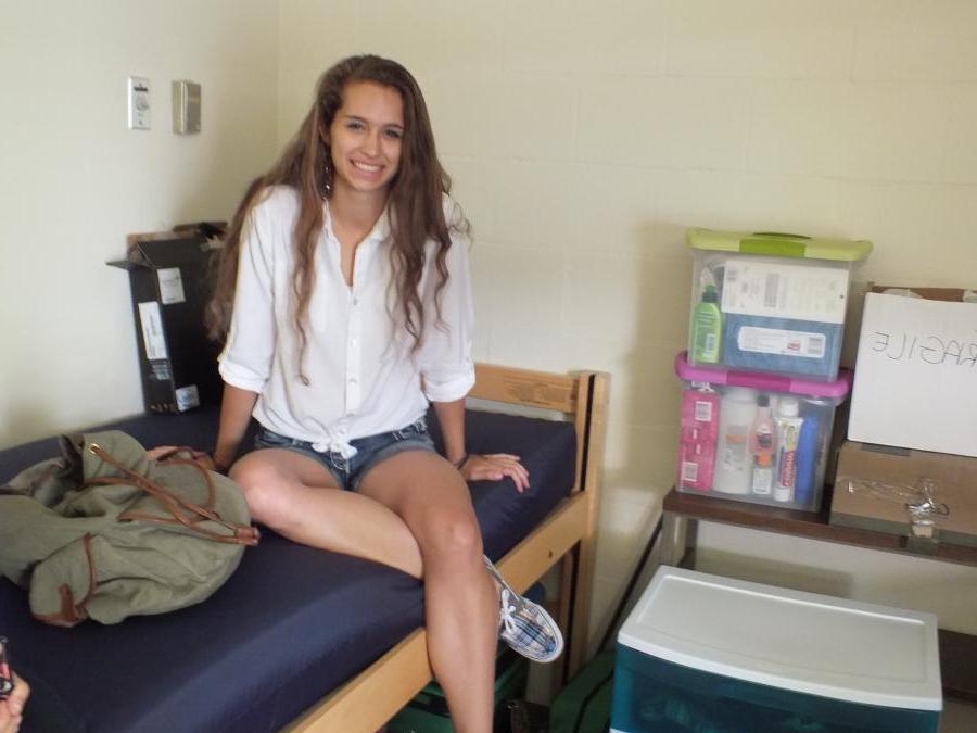 Jenna Justman sits in her dorm